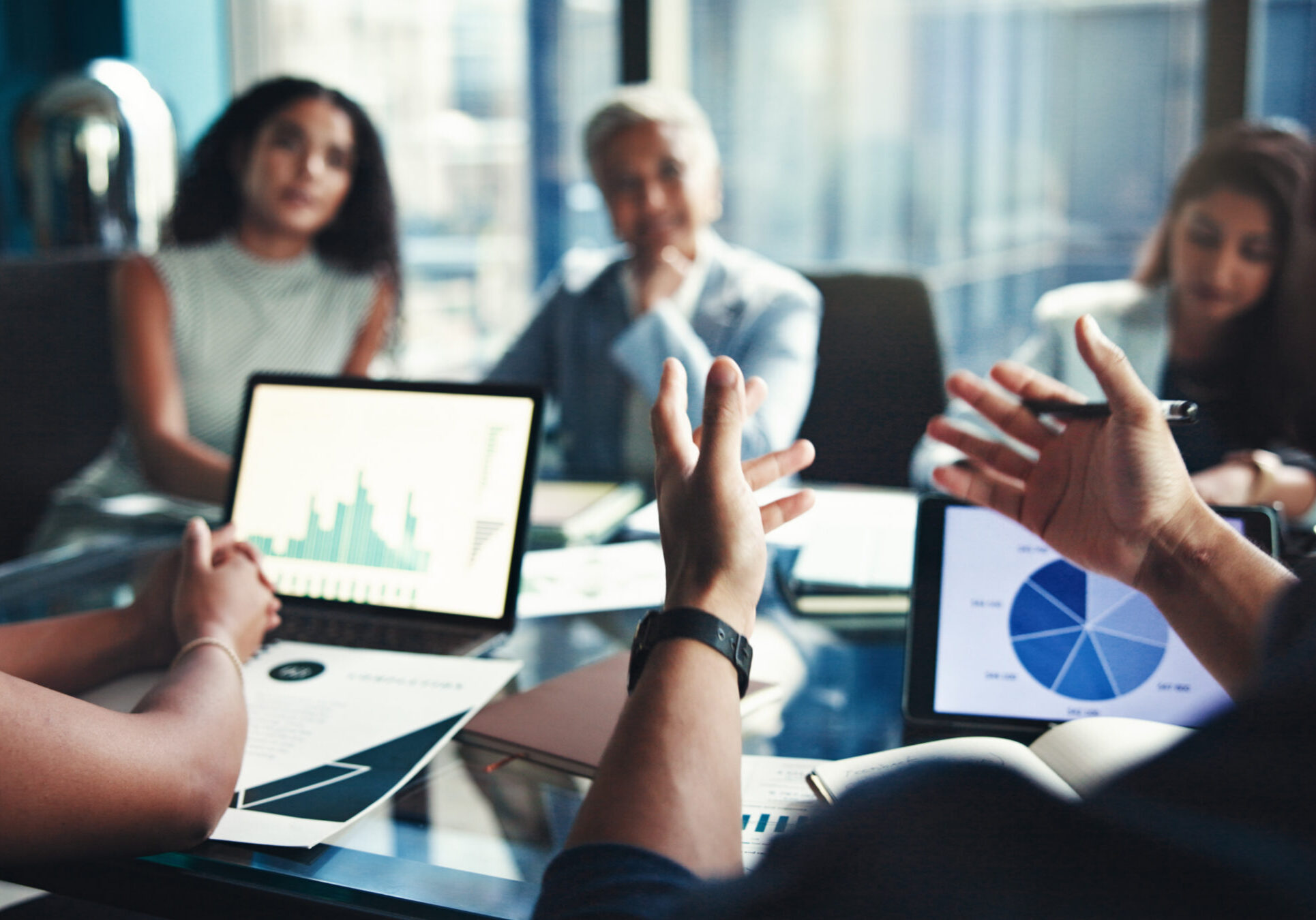 Finance, hands and tablet screen with business people in office boardroom for investment opportunity. Growth, portfolio and presentation with financial team in workplace for wealth management